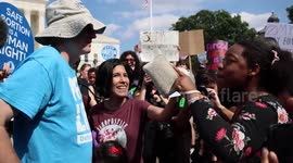 Pro-life supporter clashes with abortion activists outside Supreme Court in Washington DC