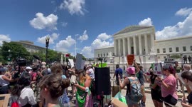 Abortion rights demonstrations rally in front of Supreme Court on day after Roe is overturned