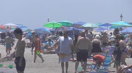 Millions pack beaches amid heatwave in eastern USA