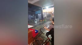 Powerful winds blow over portable houses in northern China