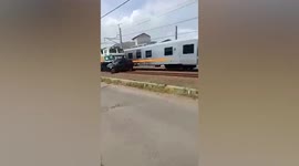 Driver killed when train crashes into car in Indonesia
