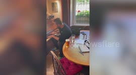 Chris Martin makes a surprise appearance singing a Coldplay classic to an engaged couple