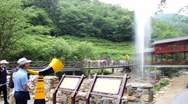 Tourists shout into instrument to control fountain in central China