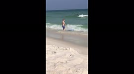 Boy Plays With Boogie Board