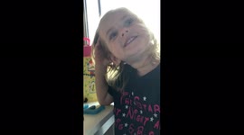 Girl Blows Bubble With Gum