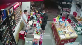 Chinese shopkeeper fly kicks thief's car after he steals cigarettes from store