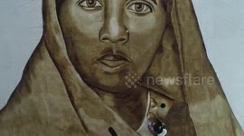 Indian artist attempts to set record for world's largest coffee painting