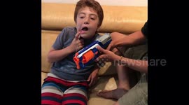 Boy Pulls Brother's Tooth With Dart