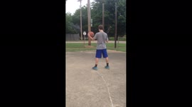 Boy Hits Basketball With Bat