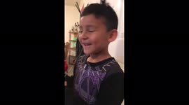 Boy Pulls Out Loose Tooth