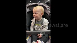 Baby Spits Bubbles in Airport
