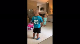 Boy Pretends to Shoot SIster