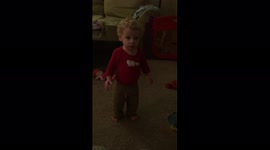 Boy Dances While Woman SIngs