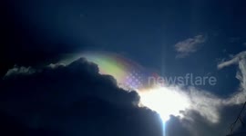 Cloud iridescence illuminates sky in the Philippines