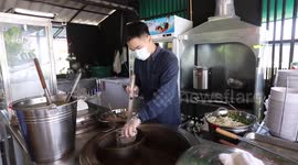Locals tuck into giant meat ball soup at noodle restaurant in Thailand