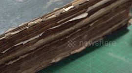 Thai 'book doctor' restores clients' dilapidated books from around the world
