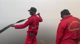 Air fills with smoke as peatland fires burn in South Sumatra