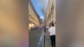 Paris fire sends smoke billowing in front of Eiffel Tower