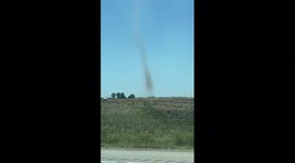 Hellacious dust devil spotted slams Munfordville, Kentucky