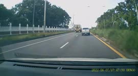 Terrifying moment out-of-control lorry crosses central island into oncoming cars
