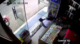 Chinese police officer collapses in shop after directing vehicles in blistering heat