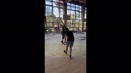 Professional athlete makes a performance in a destroyed hall in Kyiv