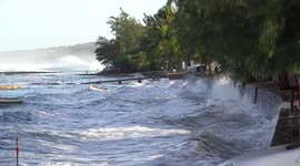 Sea Level rise in Reunion Island, ocean waves crashing on wall