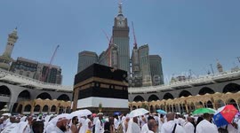 Muslim pilgrims attend Friday prayer around the Kaaba, Islam's holiest shrine, at the Grand mosque in the holy Saudi city of Mecca, during annual Hajj pilgrimage
