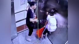 Elderly woman slaps young girl after being hit by elevator door in China