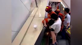 Firefighters rescue boy who got head stuck between escalator and wall in China