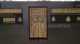 Muslim pilgrims attend an exhibition to prepare the cover of the Holy Kaaba, during the annual hajj pilgrimage, in Mecca, Saudi Arabia