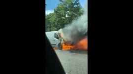 Woah! Driver overtakes car as its tyre explodes