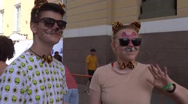 People dressed up as Piter cats for the parade on Palace square, St Petersburg, Russia