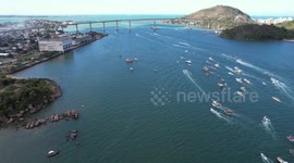 Dozens of boats take part in maritime procession through coastal Brazilian city