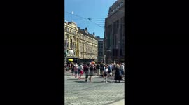 People flock to the LGBTQ+ Pride Parade in Helsinki, Finland