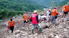Rescue teams recover bodies after landslide kills more than 40 in north-eastern India