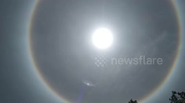 Beautiful sun halo forms in sky over Thailand