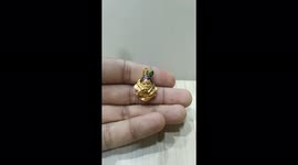 this video contains hollow gold shri krishna pendant jewellery