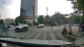 Narrow miss for drivers after outer wall falls off high-rise building