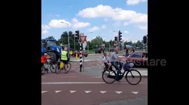 Dutch farmers driving tractors block supermarkets, roads and highways during protest