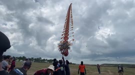 Huge dragon-shaped kite resembles stairway to heaven at Indonesian festival