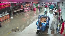 Driverless three-wheeler does doughnuts before crashing into stall