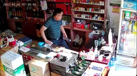 Glass containing hot water shatters after nearby lighter explodes