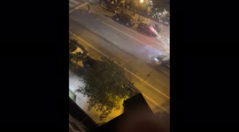 Car driving recklessly while passenger shoots fireworks at bystanders on residential street in downtown Minneapolis on July 4