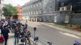 Media wait outside Downing Street for embattled PM Boris Johnson