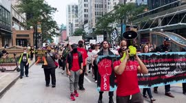 Hundreds march through central Chicago to protest police shooting of Jayland Walker