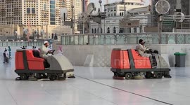 Cleaners swipe the floor at the Kaaba, Islam's holiest shrine, at the Grand mosque