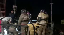 Diver holds teenagers hand for two hours in dam rescue in Russia