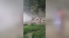 Panicked tourists flee sudden waterfall surge in the Philippines