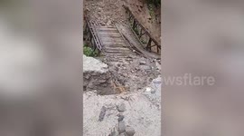 Bridge collapses after being battered by storms in Kachin State, Myanmar